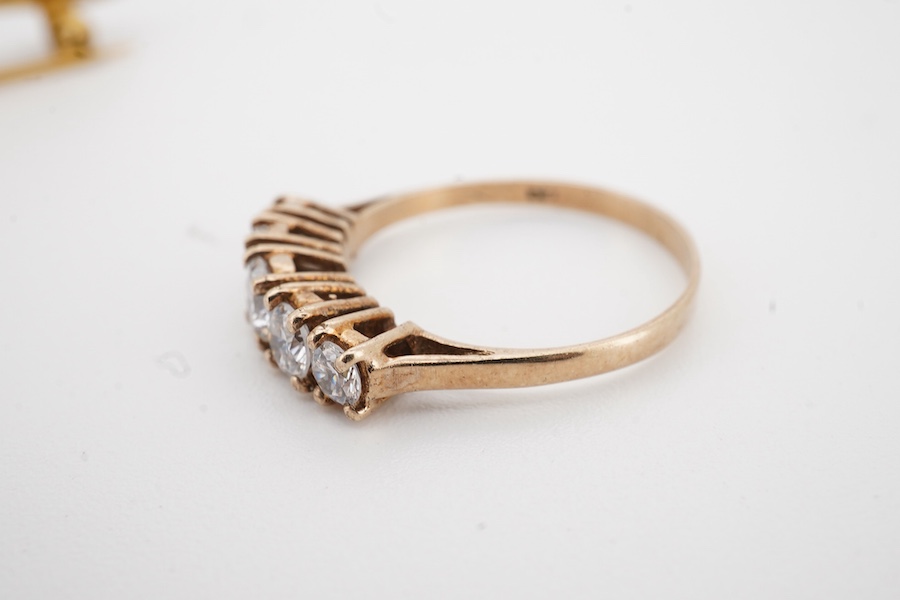 A 1960's Garrard & Co 9ct gold and two colour enamel sweethearts brooch, 36mm, with Asprey box, together with a 9ct gold and five stone simulated diamond set half hoop ring.